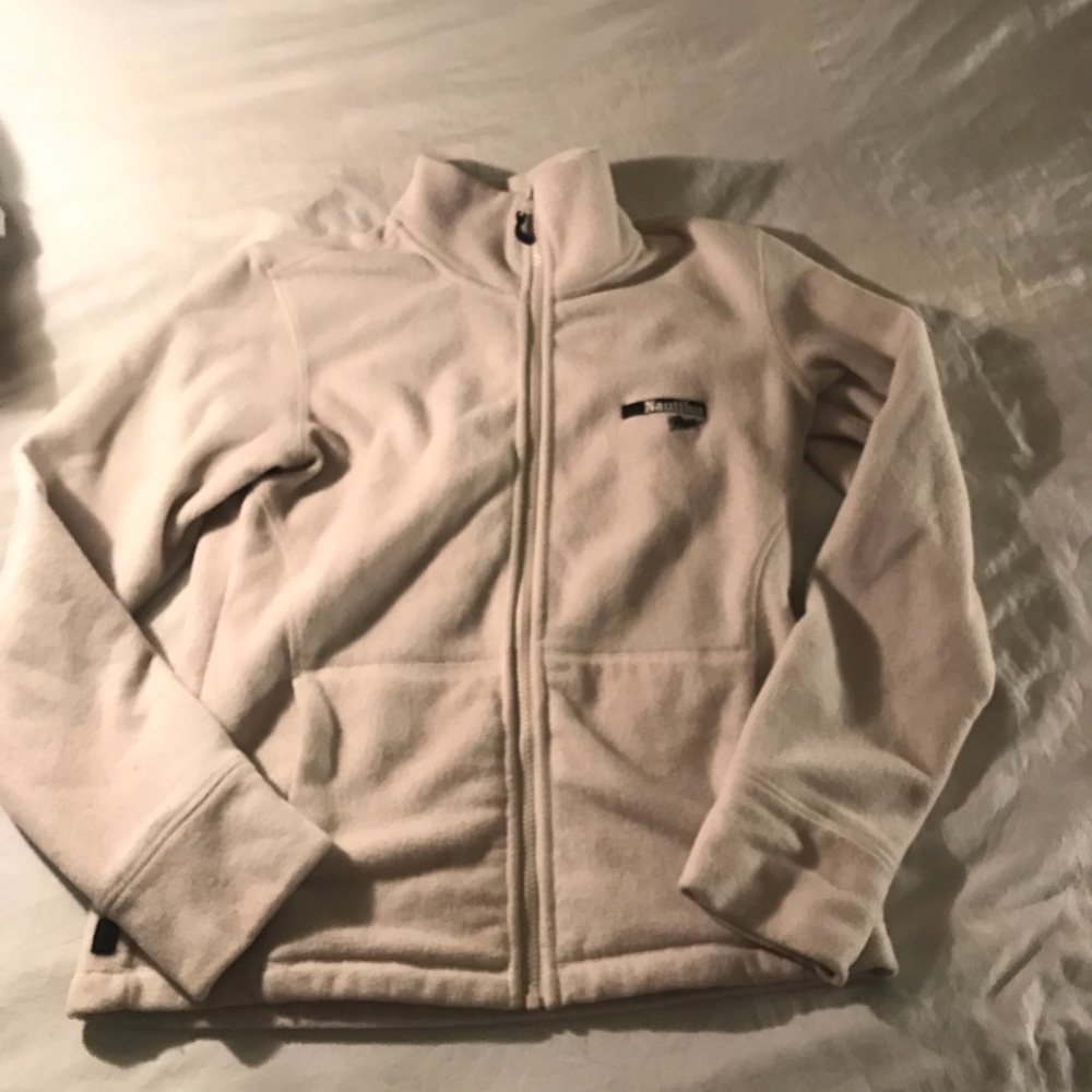 Nautilus Plus white sweater vest